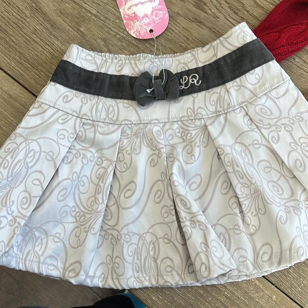 Dillards girl’s red sweater and skirt NWT size 6